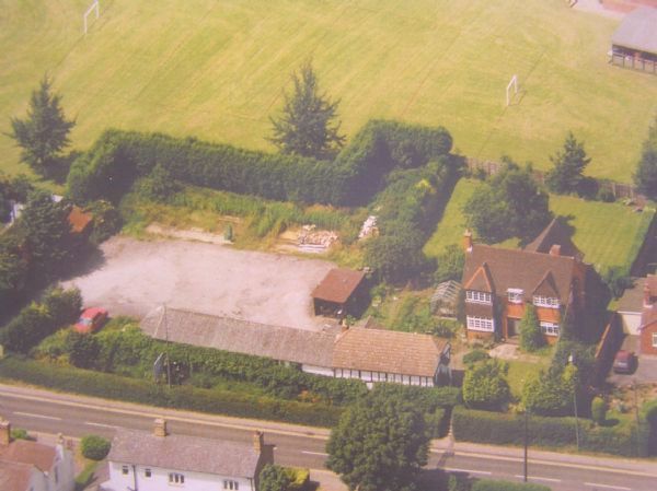 BLETCHLEY - A three bedroom detached property with a potential building plot (subject to planning), four garages, off road parking for 20 vehicles and Grade II listed cottage in need of refurbishment.� Viewing recommended. - Photo 1